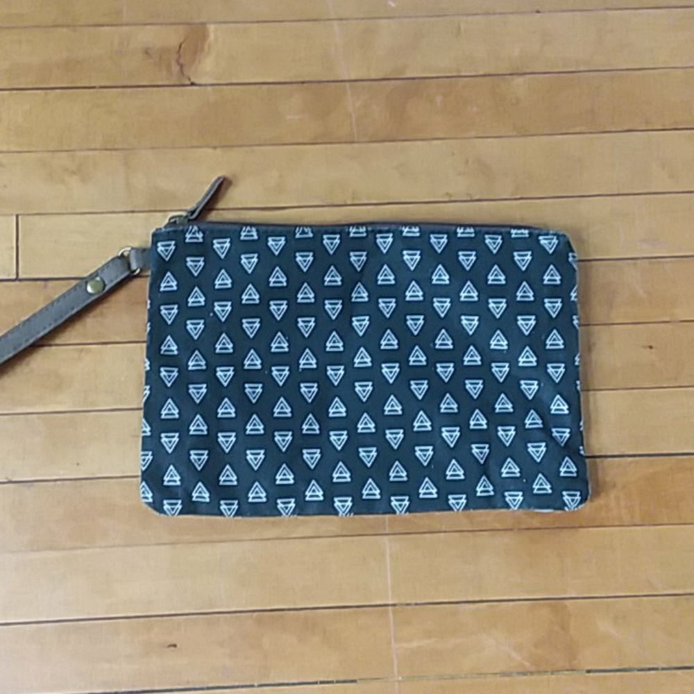 Black cosmetic bag with mini white triangles